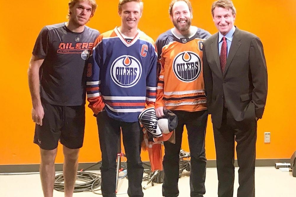 Photo of contest winner Peter Bradshaw with Wayne Gretzky and Connor McDavid.
