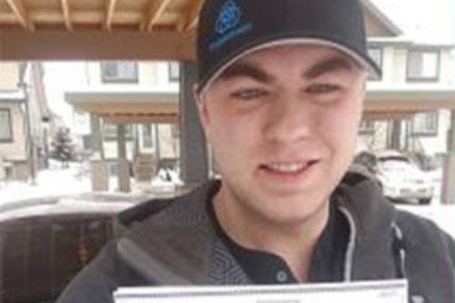 Photo of contest winner Kacey Rudanec holding cheque